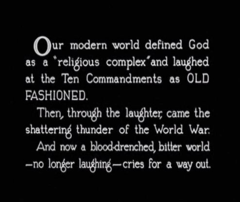 A title card introducing the film, blaming World War I on disobedience to The Ten Commandments.